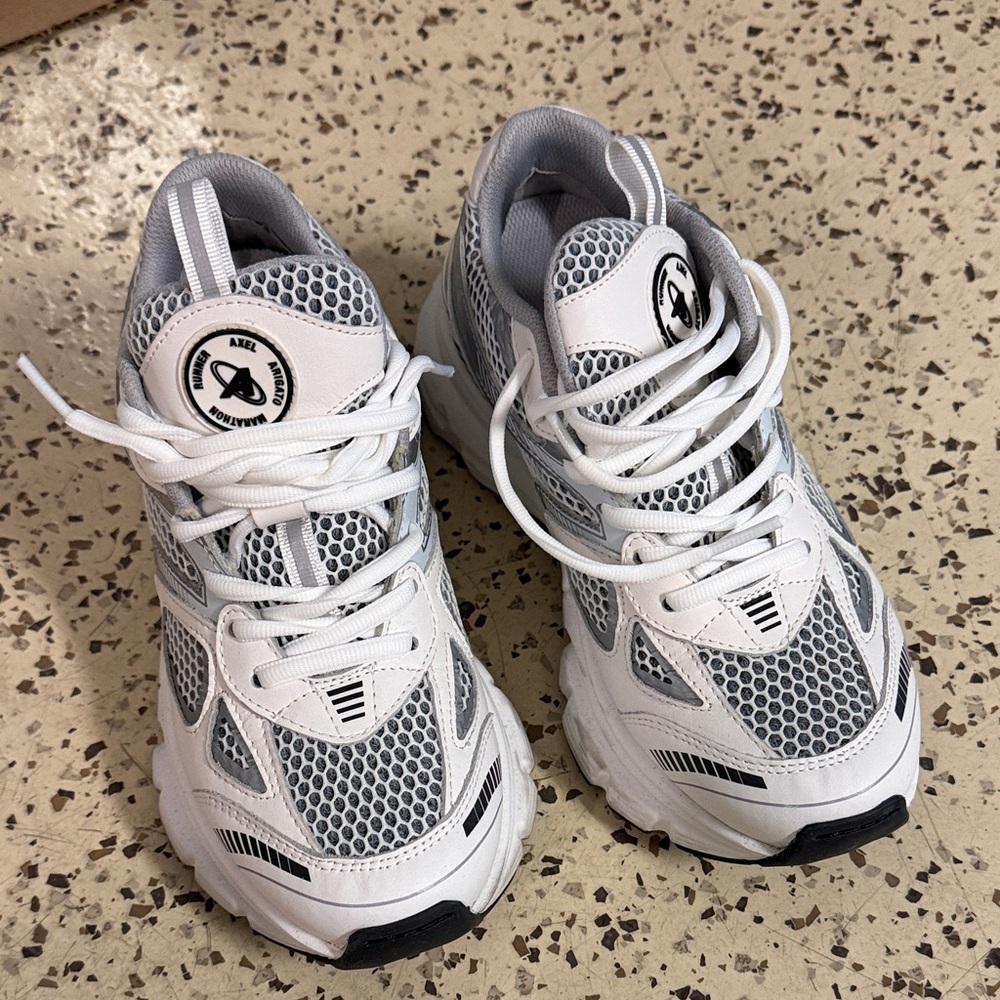 Axel Arigato White and Black Sneakers